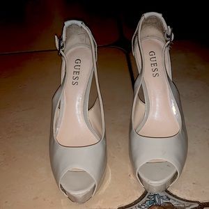 GUESS nude peep toe sling back pumps